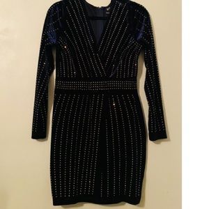 Navy dress with sparkle jewels to give you the extra shine. Worn twice.